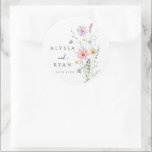 Delicate Wildflower Meadow Wedding Classic Round Sticker<br><div class="desc">Add a sweet finishing touch to your celebration with these watercolor wildflower round stickers, featuring a delicate field of hand-painted blooms in shades of blush pink, lavender, powder blue and soft sage green. Personalized with your names and wedding date, these versatile stickers are perfect for sealing envelopes, decorating favor bags,...</div>