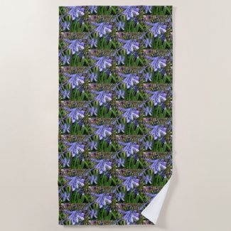 Delightful Purple Lilies of the Nile Floral Beach Towel