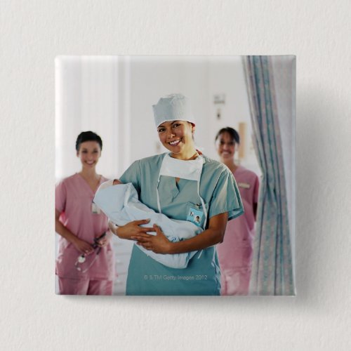 Delivery room nurse holding baby nurses in pinback button