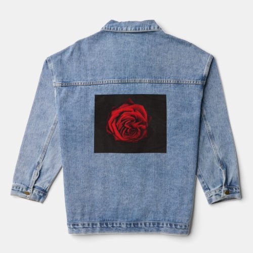 Denim jacket featuring a red rose on the back 