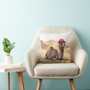Desert Camel Wearing a Red Retired Cap Throw Pillow