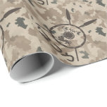 Desert Maccabee Shield And Spears Wrapping Paper<br><div class="desc">A military brown "subdued" style depiction of a Maccabee's shield and two spears on a desert camo background. The shield is adorned by a lion and text reading "Yisrael" (Israel) in the Paleo-Hebrew alphabet. Modern Hebrew text reading "Maccabee" also appears. The Maccabees were Jewish rebels who freed Judea from the...</div>