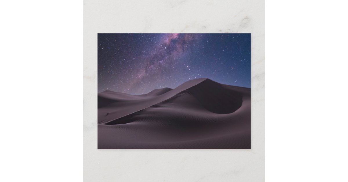 Milky way in a starry sky over a giant sand dune, Dubai, UAE