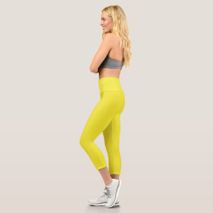 Design with a Yellow Background and Black Border Capri Leggings