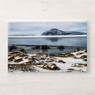Desolate Frozen Lake with Snow-Dusted Mountain Lan HP Laptop Skin