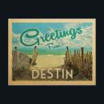 Destin Beach Vintage Travel Postcard<br><div class="desc">This Greetings From Destin vintage postcard design features a sandy beach with a beautiful turquoise ocean water and above the sea,  a blue sky with billowy white clouds. In vintage travels style.</div>