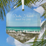 Destin Florida Beach Trip Ocean Keepsake Christmas Glass Ornament<br><div class="desc">This beautiful Destin Florida beach vacation keepsake Christmas ornament features the pretty blue green ocean waters of Sandestin along the coast. Pretty teal and blue umbrellas line the summer seashore in front of the sea grass. Lovely white cursive script for my favorite seaside city along the emerald coast. Customize with...</div>