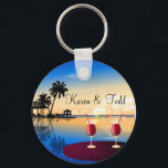 Destination wedding = customize with your own name keychain<br><div class="desc">Relaxing beach scene with tiki huts and party drinks with umbrellas and palm trees.  Perfect decor for destination weddings.</div>