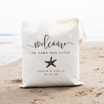 Destination Wedding Welcome Bag | Starfish<br><div class="desc">Welcome guests to your destination wedding with these chic and modern personalized tote bags. Design features "welcome" in modern handwritten calligraphy script,  with space to personalize with your wedding location,  names and date. A beachy,  tropical starfish silhouette illustrations completes the design.</div>
