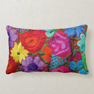 Detail of traditional embroidery floral textile lumbar pillow
