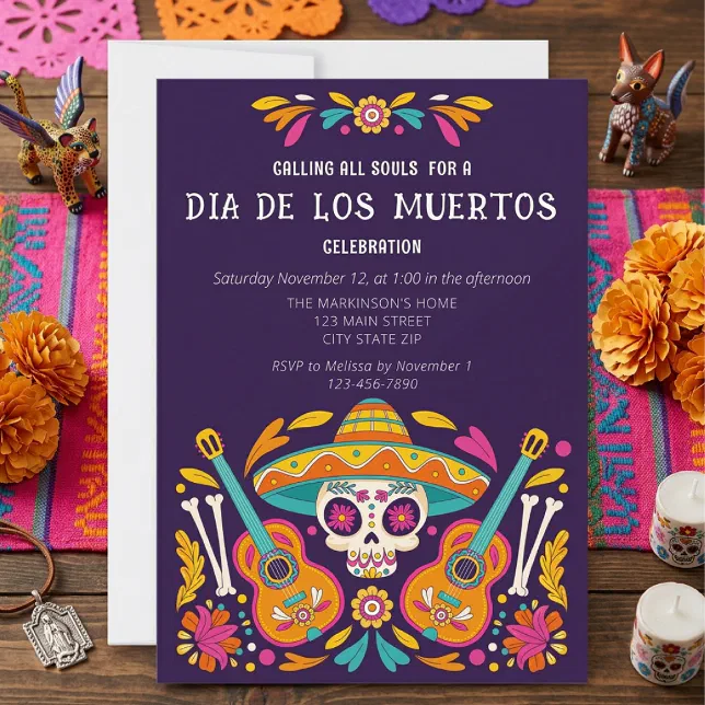 A Día de los Muertos-themed card set against a background consisting of marigolds, candles, animal figurines, and papeles picados.