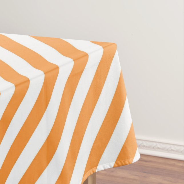 Diagonal orange and white stripes pattern tablecloth (In Situ)