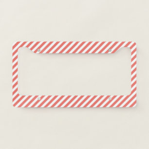 Diagonal pattern of pink and white stripes license plate frame