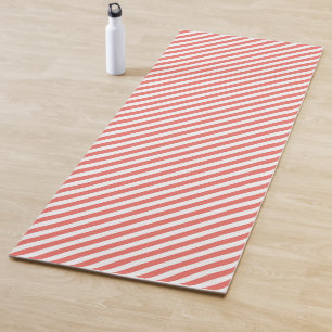 Diagonal pattern of pink and white stripes yoga mat