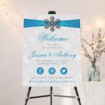Diamante Snowflake & Blue Ribbon Winter Wedding Foam Board<br><div class="desc">The diamanté snowflake & blue ribbon wedding collection is perfect for any couple planning a romantic winter wedding celebration. The design features a light silvery grey and white snowflake textured background with a diamanté snowflake on top of a silky looking ribbon. The wording incorporates the same silvery grey and blue...</div>