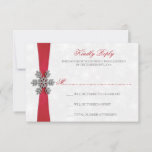 Diamante Snowflake & Red Ribbon Winter Wedding RSVP Card<br><div class="desc">The diamante snowflake & red ribbon wedding collection is perfect for any couple planning a romantic winter wedding celebration. The design features a light silvery grey and white snowflake textured background with a diamante snowflake on top of a silky looking ribbon. The wording incorporates the same silvery grey and red...</div>