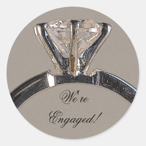 Diamond Engagement Ring on Gray Envelope Seals