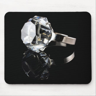 Diamond ring on black mouse pad