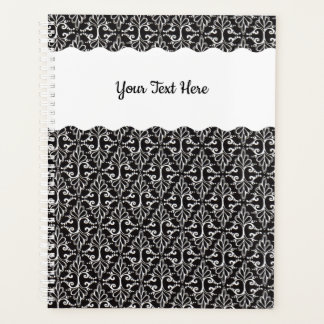 Diamond shaped White ornate Scrolls on black Planner