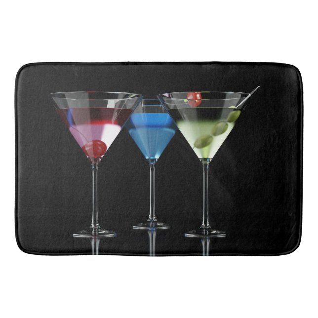 Different cocktails in martini glasses on black bath mat (Front)