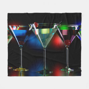 Different cocktails in martini glasses with lights fleece blanket
