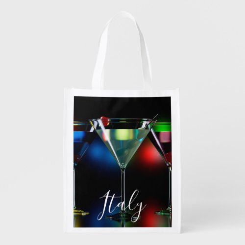 Different cocktails in martini glasses with lights grocery bag