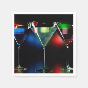 Different cocktails in martini glasses with lights napkins