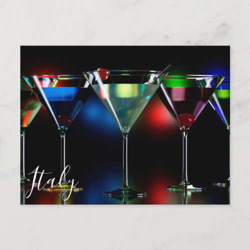 Different cocktails in martini glasses with lights postcard