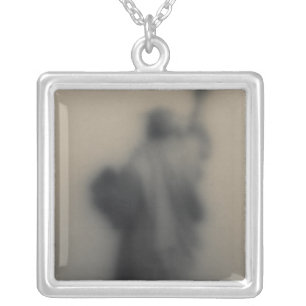 Diffused image of the Statue of Liberty Silver Plated Necklace