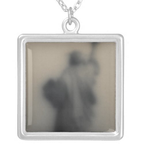 Diffused image of the Statue of Liberty Silver Plated Necklace