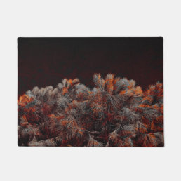 Digital art of pine tree with orange color spots doormat