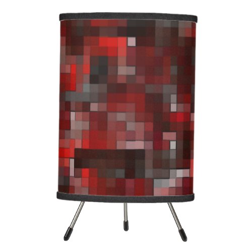 Digital mosaic of squares in red shades and gray tripod lamp