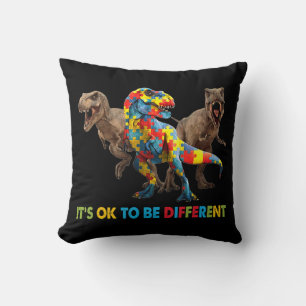 Dinosaur Autism Awareness design features a dinosa Throw Pillow