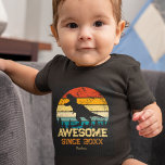 Dinosaur Birthday Boy Awesome Since Birth Year Baby Bodysuit<br><div class="desc">Does your little boy or girl love dinosaurs? This custom baby bodysuit is perfect! There's a big T-Rex dino saying RAWR on top of a distressed rainbow background. All text is editable and currently says Awesome Since 2022 and the young baby's name. Substitute with your kid's name and birth year...</div>