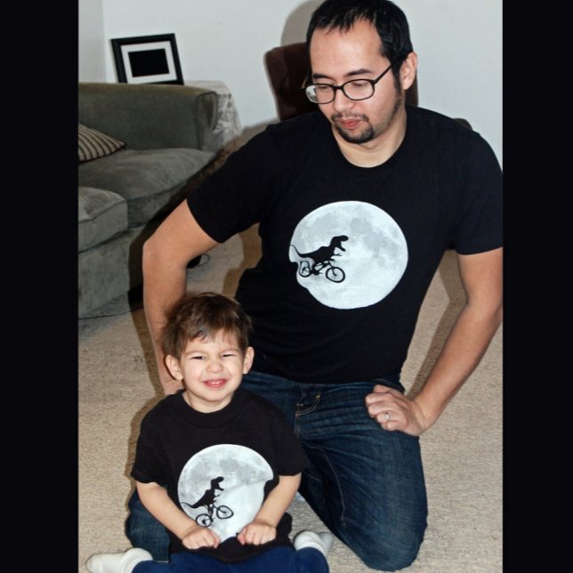 Dinosaur on a Bike In Sky With Moon  T-Shirt (Creator Uploaded)