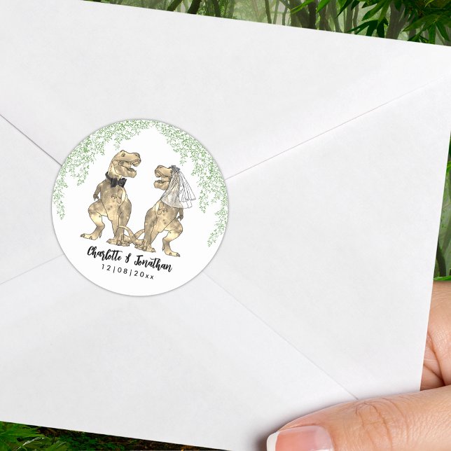 Dinosaur Theme Wedding Personalized Classic Round Sticker (Fun T-Rex Bride and Groom with jungle foliage dinosaur wedding custom sticker)