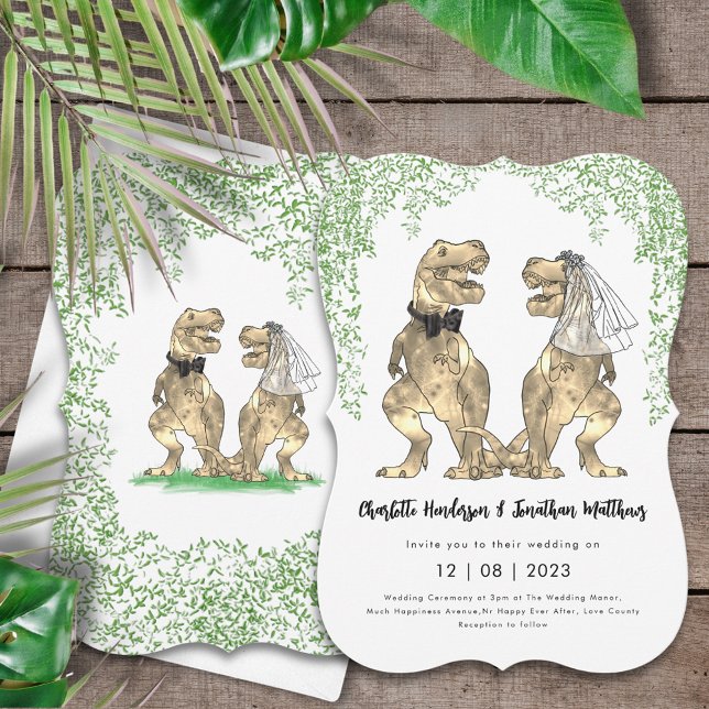 Dinosaur Wedding T-Rex Bride and Groom Invitation (Dinosaur themed wedding invitation with T-Rex bride and groom and Jurassic jungle foliage)