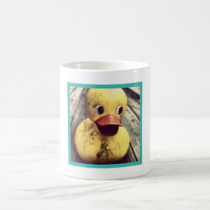 Dirty Rubber Duck Sitting on a Wooden Deck Coffee Mug