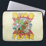Disco Fever with Scooby and Shaggy Laptop Sleeve<br><div class="desc">This electrifying graphic is a throwback to the disco era, featuring Shaggy and Scooby-Doo dressed in vibrant 70s disco attire. Shaggy strikes a dance pose with a stylish star on his forehead and a groovy patterned shirt, while Scooby-Doo sits beside him, sporting funky sunglasses and a disco ball necklace. The...</div>