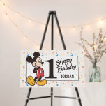 Disney's Mickey & Friends Character Birthday Foam Board<br><div class="desc">This charming Mickey Mouse 1st Birthday Sign features the iconic Disney character in his classic red shorts and yellow shoes, standing confidently beside the bold number "1." The text "Happy Birthday" and the customizable name is elegantly displayed, creating a personalized and heartwarming touch. The design is adorned with multicolored Mickey-shaped...</div>