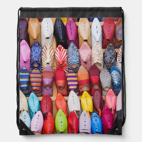 Displayed shoes in a shop in the souks drawstring bag