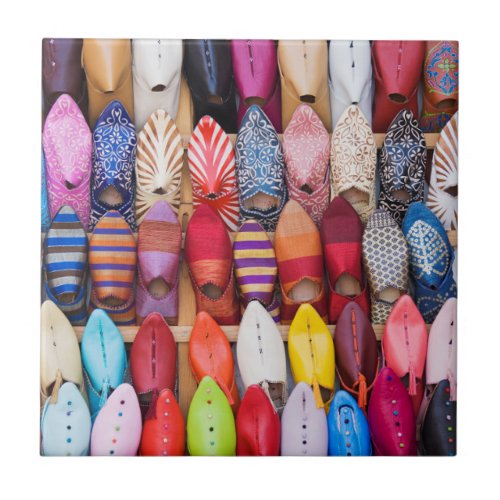 Displayed shoes in a shop in the souks tile