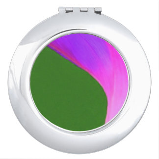 Distinctive compact mirror