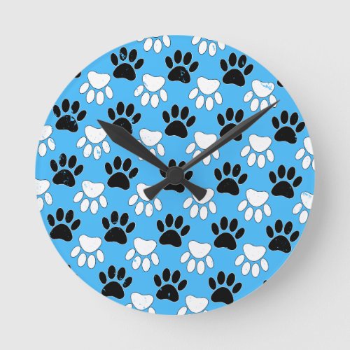 Distressed Black And White Paws On Blue Background Round Clock