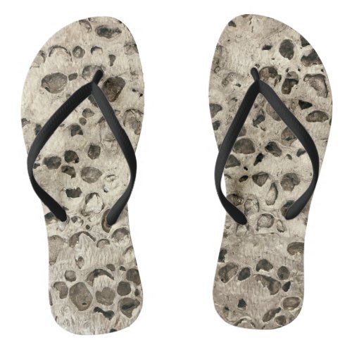 Distressed concrete small stones rocks beach flip flops