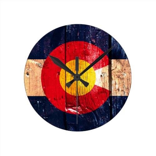 Distressed rustic wooden Colorado state flag Round Clocks