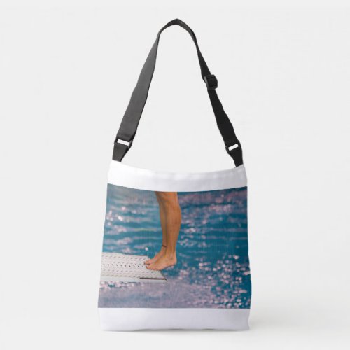 dive from diving board on cross body bag