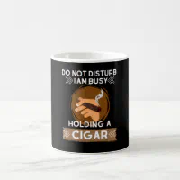 https://rlv.zcache.com/do_not_disturb_i_am_busy_holding_a_cigar_coffee_mug-r091c10921adf483b905e004a6f41150b_x7jg5_8byvr_200.webp