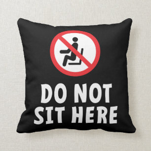 Do not sit here. Don't sit here in this chair Throw Pillow