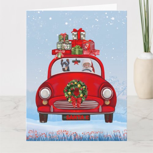 Doberman Dog In Car With Santa Claus Card